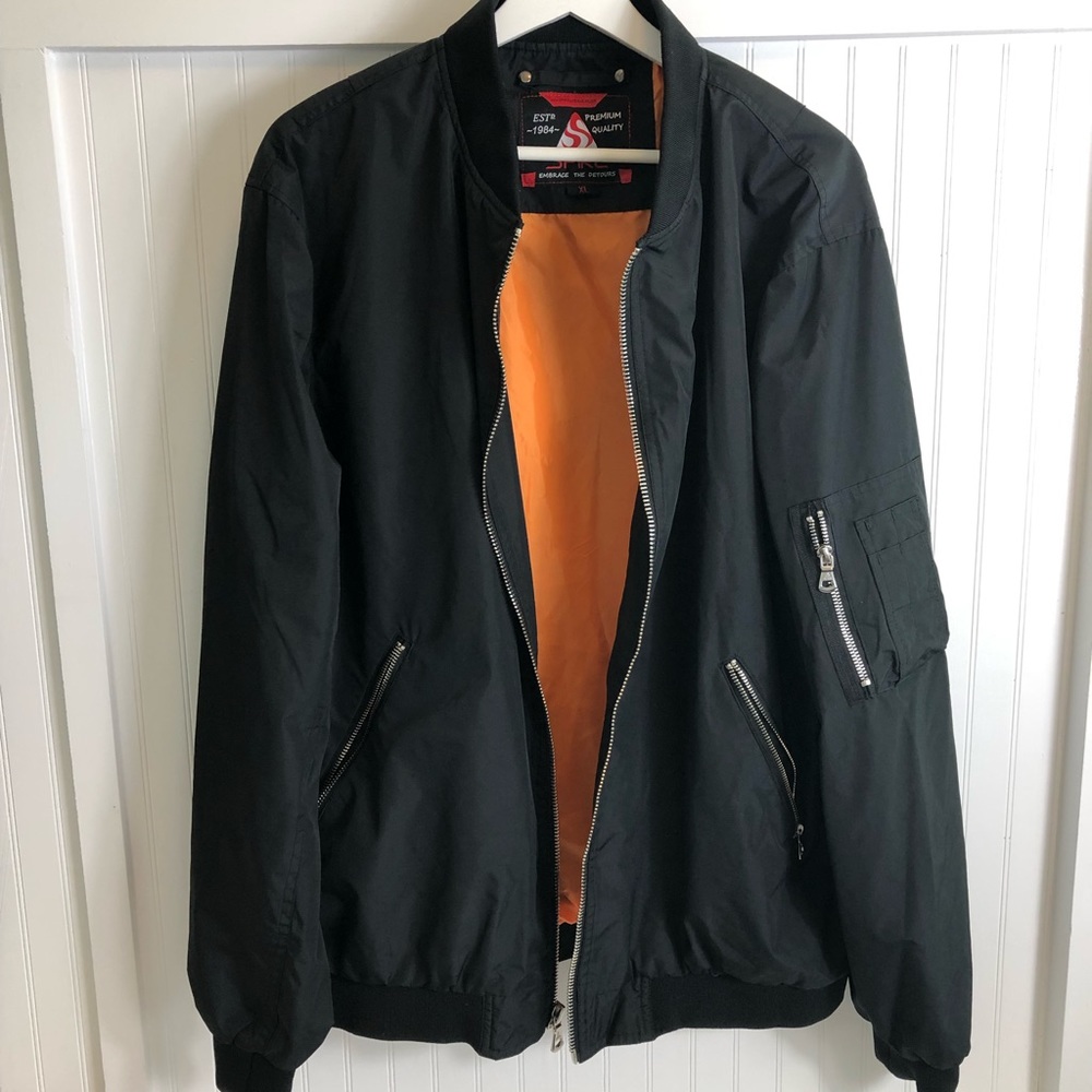 Spire men’s black/orange zip-up jacket.